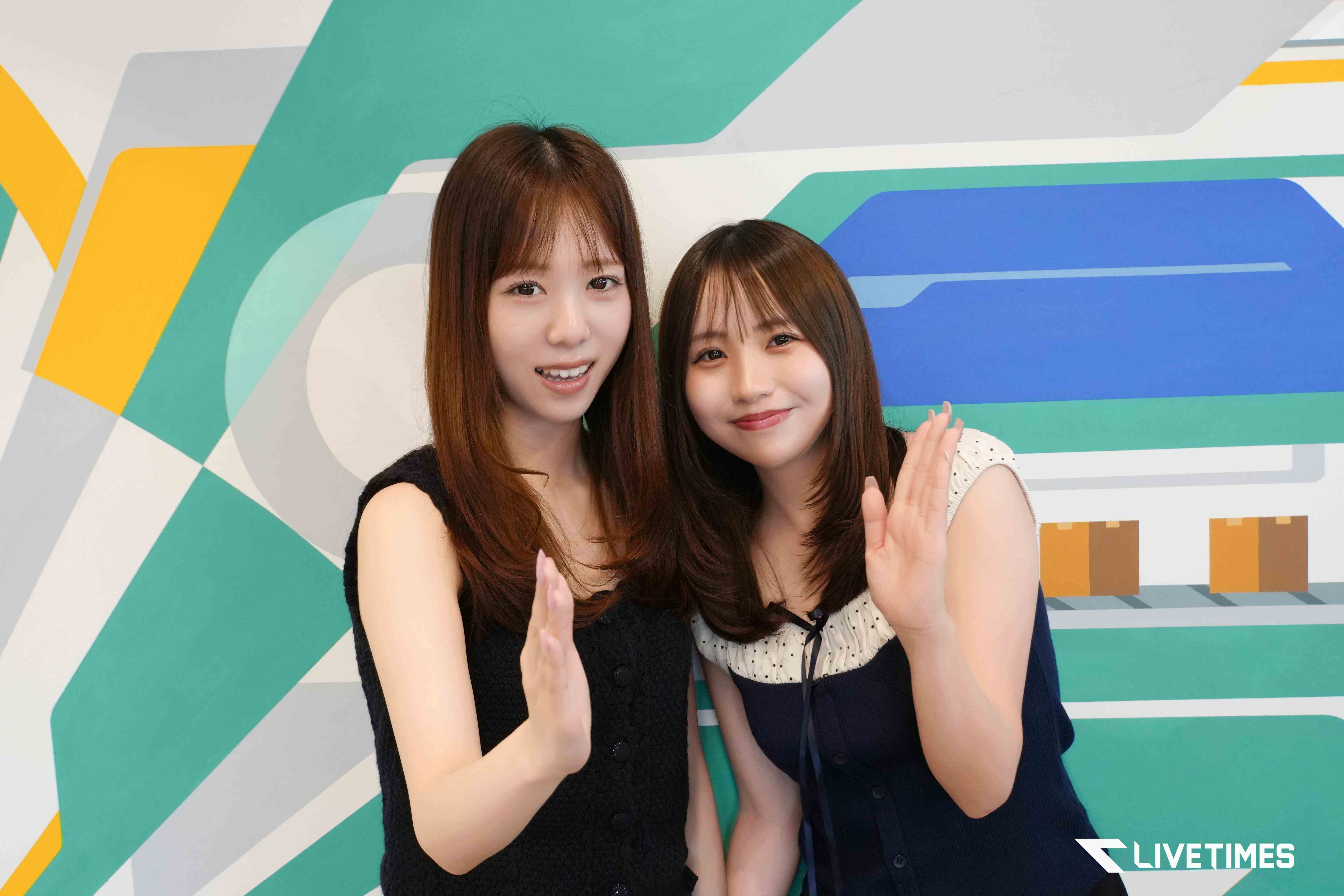 Two young women smiling and waving at the camera in front of a bright geometric mural; LIVETIMES logo in the bottom-right corner.